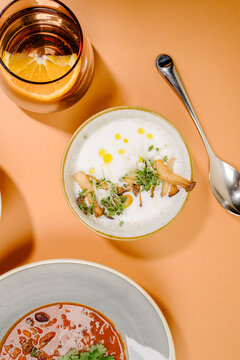 Two gourmet soups on restaurant menu, top view setting