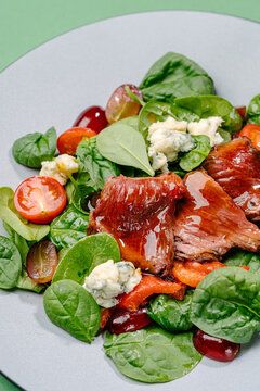 Roast beef and blue cheese spinach salad with grapes
