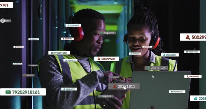 Vertical video: Tapping tablet techs pointing at laptop in DC, vests, red muffs, reviewing overlays
