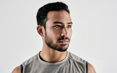 Obraz premium Serious, thinking and man with fitness in studio for reflection, exercise pride and healthy body. Personal trainer, bodybuilder and membership for training, sportswear and athlete on white background
