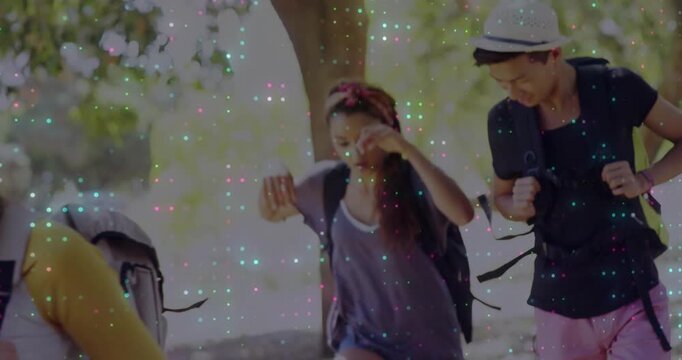 Camera panning right, headband hiker adjusting backpack and stepping down to regain balance