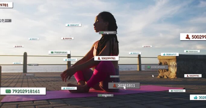Sitting woman in leggings stretching for yoga on pink mat by ocean, labels appearing