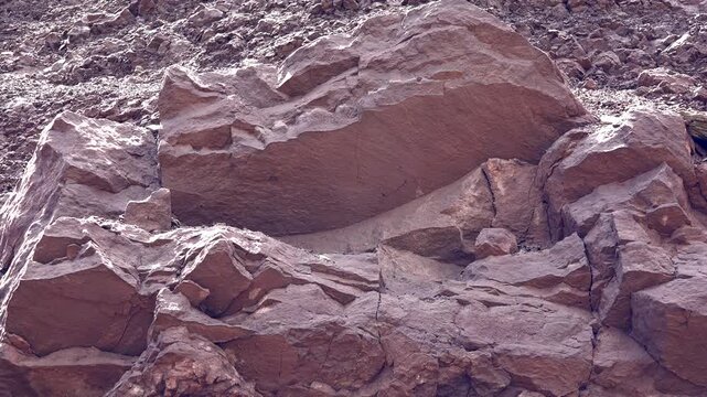 Raw mineral ore lode, rocky ground surface, natural stone deposit, remote mining landscape scene. Unprocessed metal bearing vein exposed across terrain, rugged quarry material, extraction background.