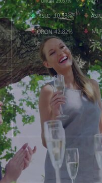 Vertical video: Guest lifting flute after talk guests clapping finance charts appearing over guests
