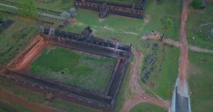 Aerial view of Cultural heritage landscape of Wat Phu Temple in Champasak, Laos. The ancient Khmer temple dedicated to Shiva stands beneath Phu Kao Mountain, religious sites of the Khmer Empire.