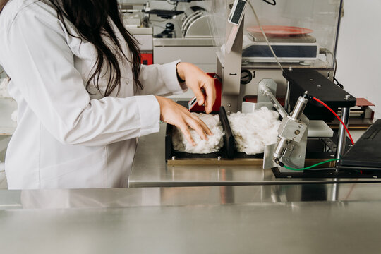 An industrial Uster HVI cotton fiber analyzer machine  in a professional laboratory setting.
