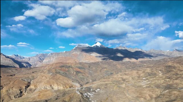 Drone Hyperlapse of Langza village and snow-capped Himalayan peaks in Spiti Valley, Himachal India.