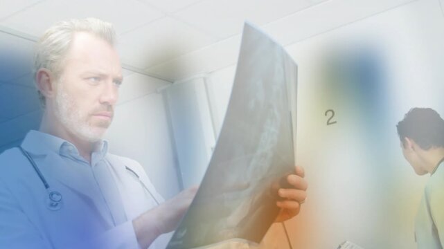 Animation of shapes over caucasian male doctor with xray