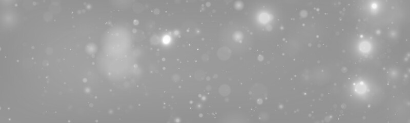 Silver snow dust floats in soft light, sparkle, shimmer, glitter bokeh. Twinkle particle, stardust...