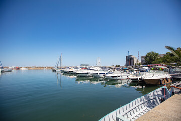 Fototapeta premium Luxury yachts and motor boats in sea port marina