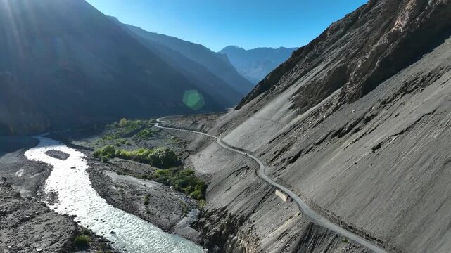 Epic cinematic drone pullback revealing massive river valley in Kinnaur, Spiti valley, himachal, Himalayas.