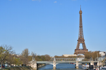 Obraz premium Eiffel Tower seen from the Seine near Pont de Grenelle in Paris, France, March 15, 2026