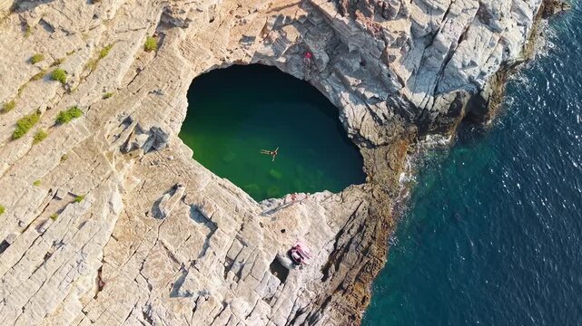 Woman Swimming in Giola Natural Sea Lagoon, Thasos
