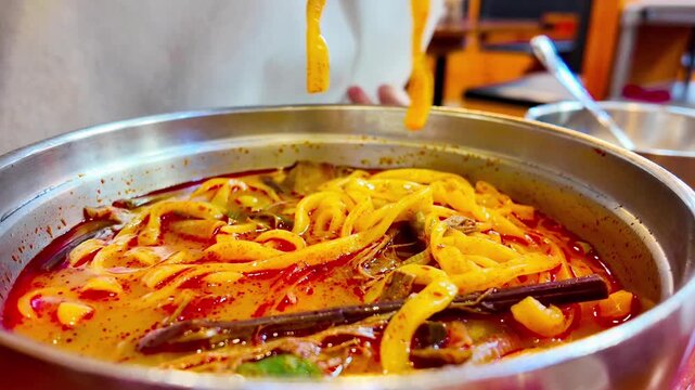 Yukgaejang kalguksu, eating korean spicy food