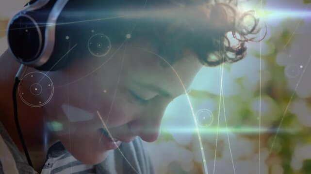 Animation of network of connections over caucasian student using headphones