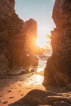 Praia da Ursa beach, Sintra-Cascais Natural Park, Portugal, cliffs in the sea at sunset