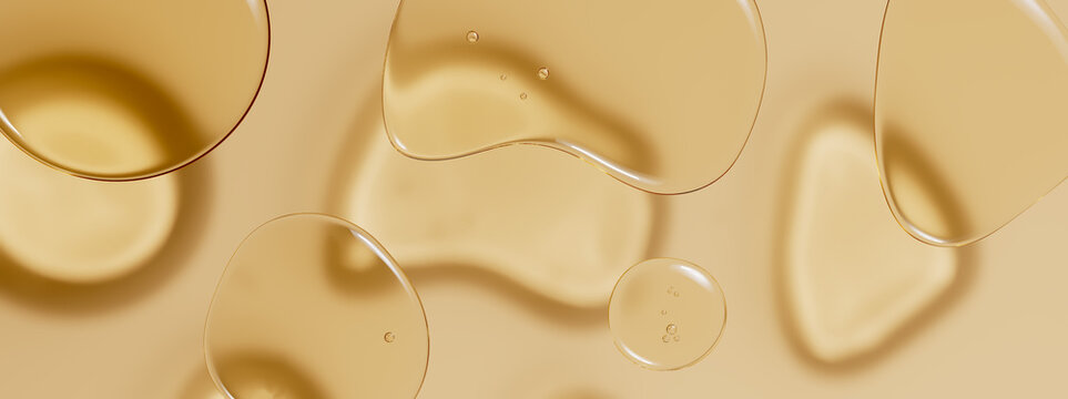 Horizontal golden transparent liquid puddle flat lay composition on matching surface. Reflects concentrated restorative botanical energy highly suitable for revitalizing essential oil label prep.