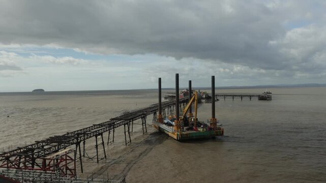 The reconstruction of the old Birnbeck pier in England, platforms and cranes