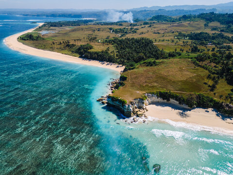 Pristine Watu Bela Beach with White Limestone Cliffs and Turquoise Water in West Sumba