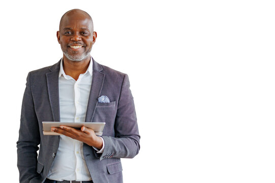 African american businessman holding a tablet, smiling at camera. He is wearing a suit jacket and white shirt. Transparent background
