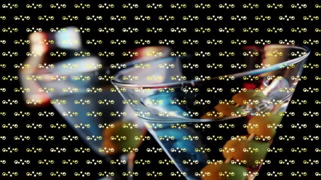 Animation of shapes over drinks with olives on black background