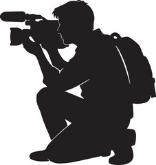 Naklejka premium A male videographer kneeling down while filming with professional equipment