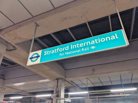 Stratford International station sign for DLR and National Rail connections in London, England