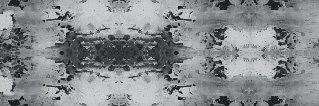 Abstract black and white textured pattern resembling a rorschach test.