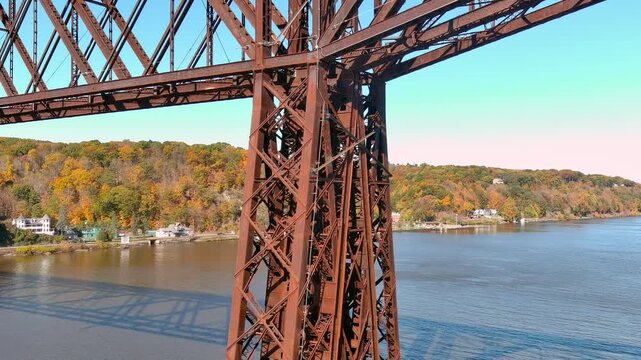 Hudson Valley Antique Rust colored bridge during peak foliage