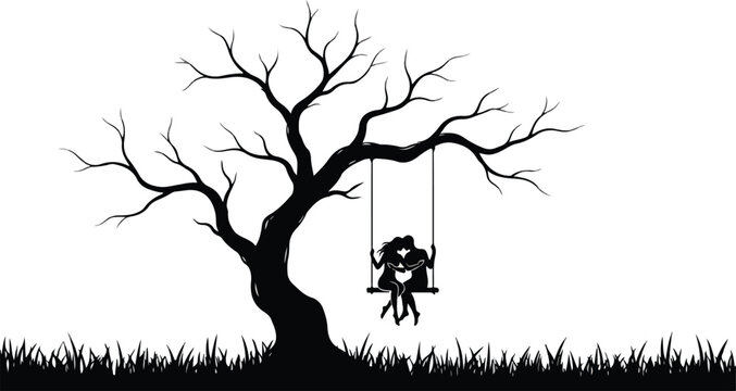 Romantic silhouette of a couple kissing on a swing under a tree.