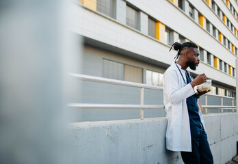 Fototapeta premium Male healthcare worker on a lunch break