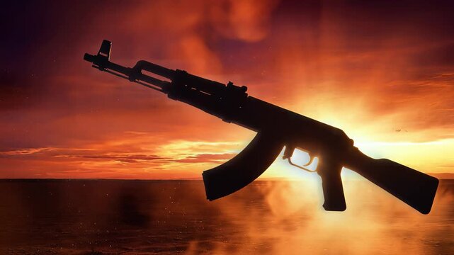 Silhouette of AK 47 Assault Rifle at Sunset