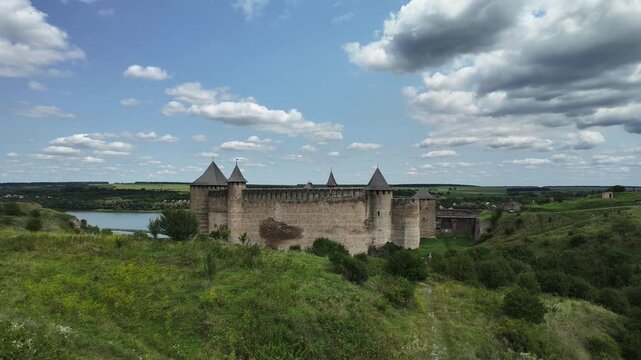 Static timelapse of Khotyn Fortress with clouds drifting above the castle. Medieval castle, popular tourist landmark in Ukraine.