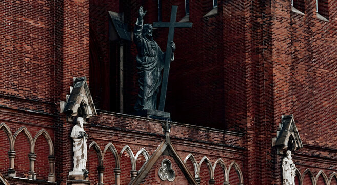 Xujiahui Cathedral Brick Facade with Religious Sculptures and Cross