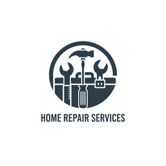 Obraz premium Home repair services logo with dark blue tools inside circle and house outline.