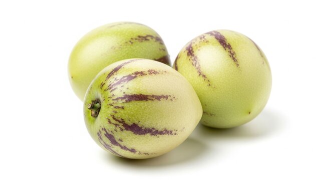 Three Fresh Ripe Pepino Melon Fruits Isolated on White
