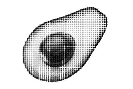 halved avocado with pit on white background