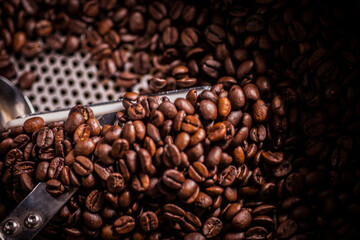 Fototapeta premium A high-precision industrial heating element and nozzle assembly for coffee roasting machines, featuring a digital sensor and red mounting hardware.