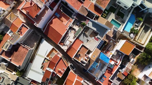 Aerial Drone Vertical Top Down Over Alvor Village Rooftops and Narrow Streets Algarve Portugal