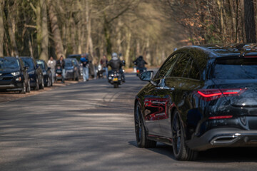 Fototapeta premium Cars and motorcycle on road with traffic congestion, urban transport concept