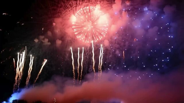 Looping multicolored fireworks grand finale on an isolated background