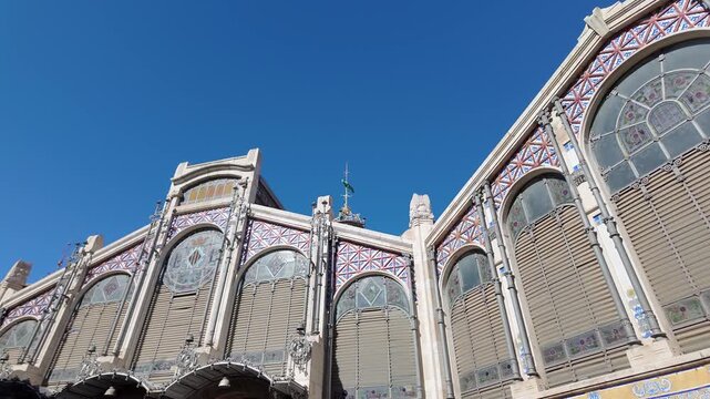 Main facade of Valencia's central market, old building with classic style, Spain.
