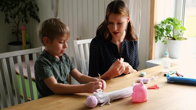 Happy Children Laugh and Fun Make DIY Toys. Kids Crafting from Fluffy wire, Bending Plush. Craft Pipe Cleaners. Leisure on Holidays. Thick Fluffy Chenille Stems for Arts. Supplies, Chenille Stems.