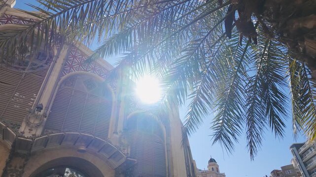 Main facade of Valencia's central market, old building with classic style, Spain.