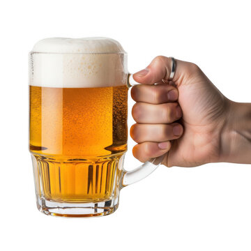 A hand holding frothy beer in a glass mug with foam on top