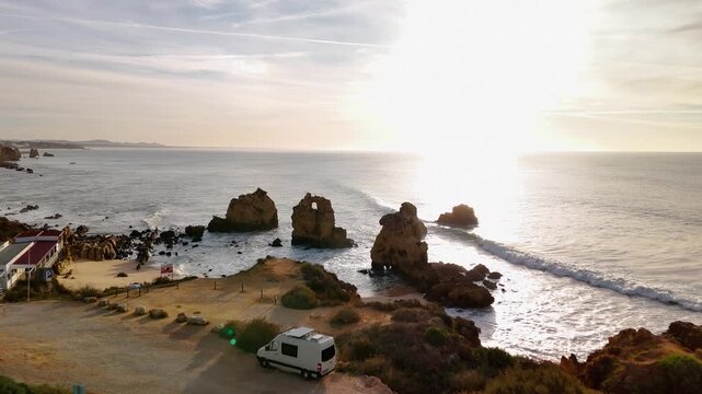 Aerial Drone Flight over Praia dos Arrifes Beach and Rugged Rock Formations in Albufeira Portugal