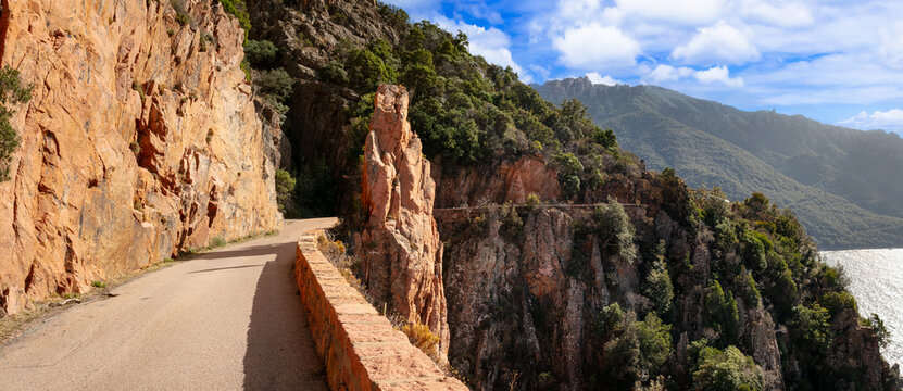 Corsica D81 Scenic Road Panorama 11K, Narrow Winding Drive over Precipice between Orange Granite Cliffs, Amazing View of Porto Gulf and Mediterranean Sea, Extreme Adventure Travel France 8K Photo