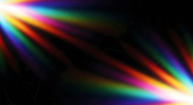 Vibrant rainbow light beams radiating from a bright white source on a dark background with colorful spectrum
