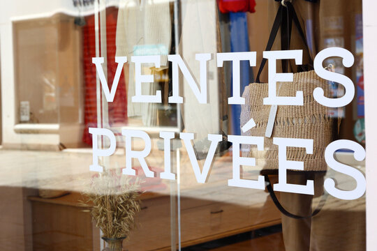 Ventes Privees - french private sales. Shopping delight at a charming boutique on a sunny summer afternoon