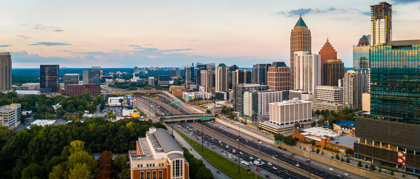 Atlanta Skyline and Highway at Sunset with Midtown Towers and Urban Traffic